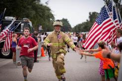 Fire Fighter running high five